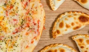 Este martes se viene la noche de la Pizza y la Empanada